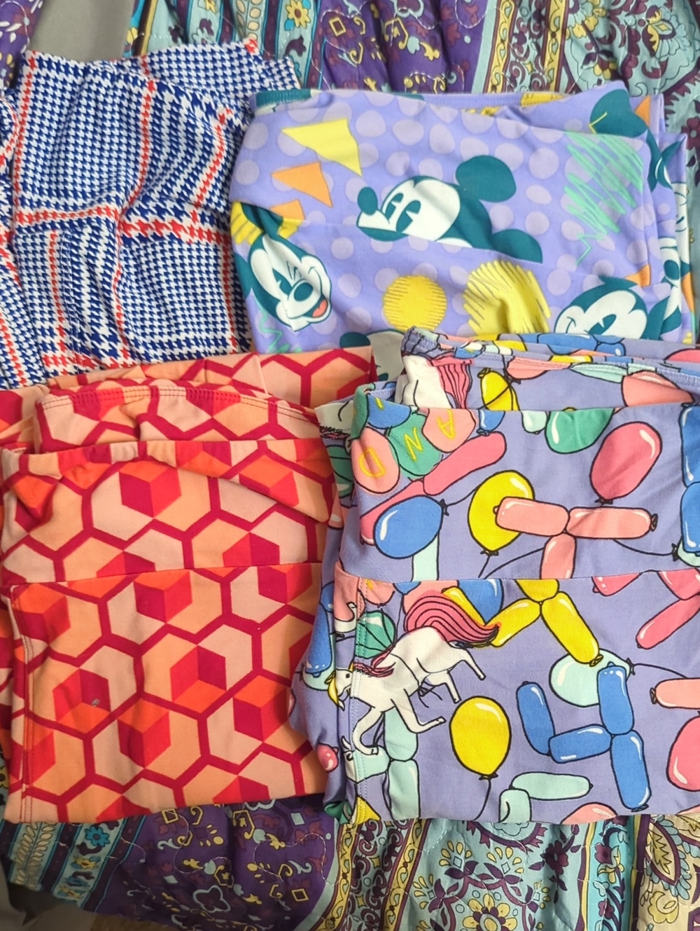 Bundle Of 4 Lularoe Leggings In Size Tall & Curvy, Includes 1 Mickey Leggings.